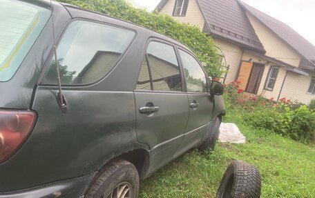 Lexus RX IV рестайлинг, 1998 год, 300 000 рублей, 10 фотография