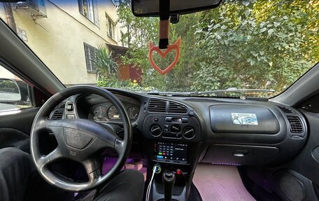 Mitsubishi Mirage VI рестайлинг, 2000 год, 250 000 рублей, 10 фотография