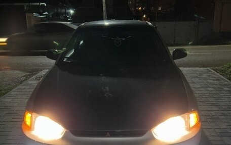 Mitsubishi Mirage VI рестайлинг, 2000 год, 250 000 рублей, 9 фотография
