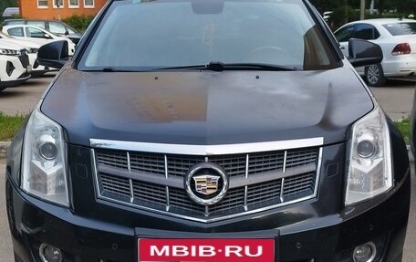 Cadillac SRX II рестайлинг, 2011 год, 670 000 рублей, 1 фотография