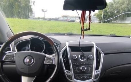 Cadillac SRX II рестайлинг, 2011 год, 670 000 рублей, 7 фотография