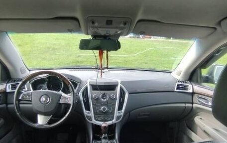 Cadillac SRX II рестайлинг, 2011 год, 670 000 рублей, 6 фотография
