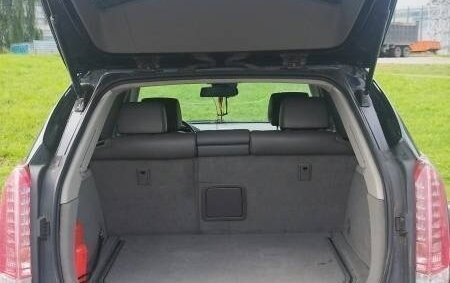 Cadillac SRX II рестайлинг, 2011 год, 670 000 рублей, 11 фотография