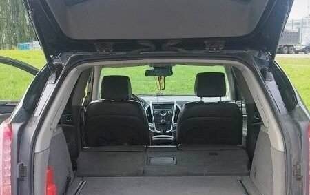 Cadillac SRX II рестайлинг, 2011 год, 670 000 рублей, 10 фотография