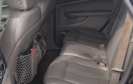 Cadillac SRX II рестайлинг, 2011 год, 670 000 рублей, 13 фотография