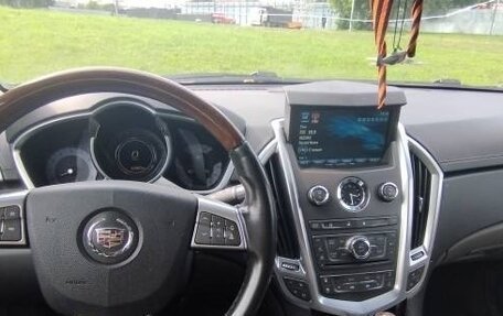 Cadillac SRX II рестайлинг, 2011 год, 670 000 рублей, 9 фотография