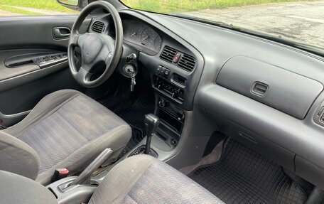 Mazda 323, 1995 год, 265 000 рублей, 11 фотография