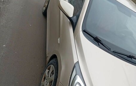 Hyundai Solaris II рестайлинг, 2011 год, 555 555 рублей, 3 фотография