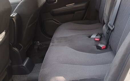 Nissan Tiida, 2010 год, 13 фотография