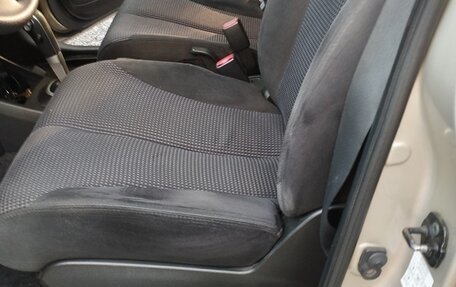 Nissan Tiida, 2010 год, 14 фотография