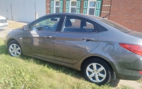 Hyundai Solaris II рестайлинг, 2011 год, 640 000 рублей, 5 фотография