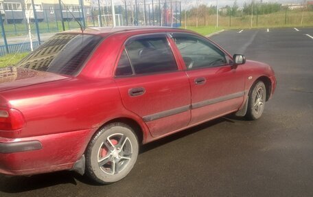 Mitsubishi Carisma I, 1999 год, 275 000 рублей, 3 фотография