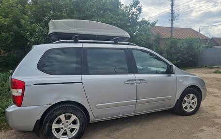 KIA Carnival III, 2009 год, 990 000 рублей, 10 фотография