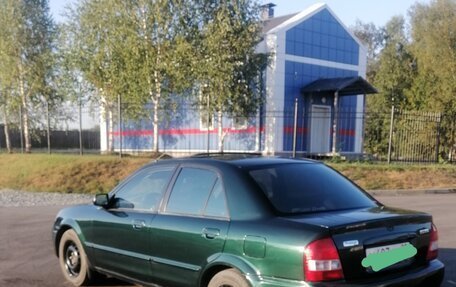Mazda Protege, 2001 год, 310 000 рублей, 11 фотография