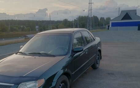 Mazda Protege, 2001 год, 310 000 рублей, 14 фотография