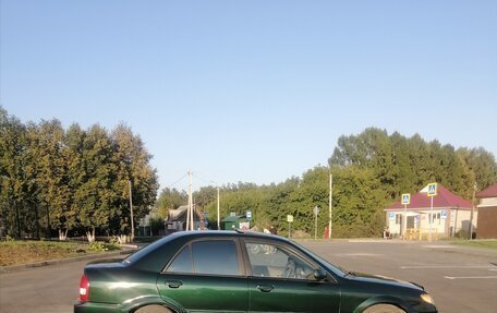 Mazda Protege, 2001 год, 310 000 рублей, 3 фотография