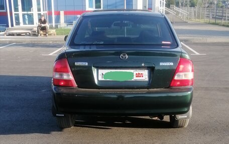 Mazda Protege, 2001 год, 310 000 рублей, 9 фотография