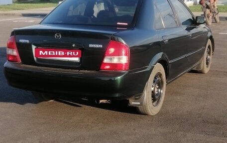 Mazda Protege, 2001 год, 310 000 рублей, 6 фотография