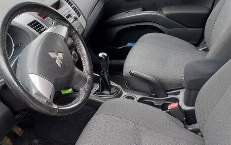 Mitsubishi Outlander III рестайлинг 3, 2011 год, 1 100 000 рублей, 11 фотография