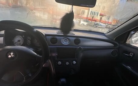 Mitsubishi Outlander III рестайлинг 3, 2004 год, 1 200 000 рублей, 17 фотография