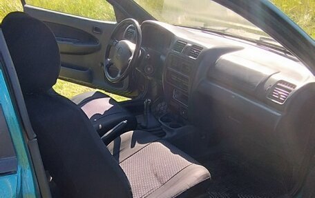Mazda 323, 1998 год, 140 000 рублей, 10 фотография