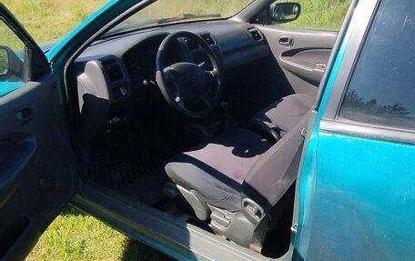 Mazda 323, 1998 год, 140 000 рублей, 7 фотография