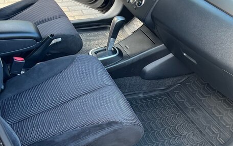 Nissan Tiida, 2012 год, 880 000 рублей, 8 фотография