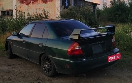 Mitsubishi Mirage VI рестайлинг, 2000 год, 130 000 рублей, 1 фотография