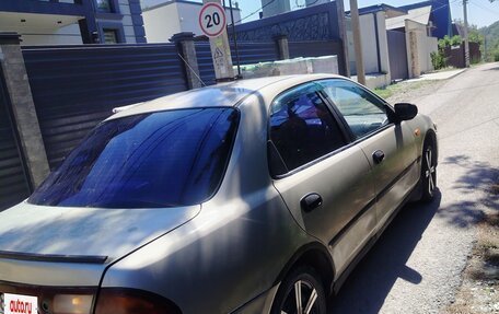Mazda 323, 1997 год, 220 000 рублей, 8 фотография