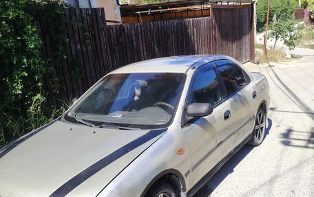 Mazda 323, 1997 год, 220 000 рублей, 10 фотография