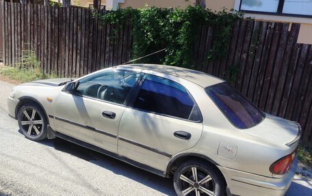Mazda 323, 1997 год, 220 000 рублей, 9 фотография