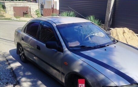 Mazda 323, 1997 год, 220 000 рублей, 4 фотография