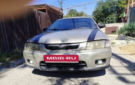 Mazda 323, 1997 год, 220 000 рублей, 3 фотография