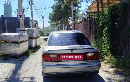 Mazda 323, 1997 год, 220 000 рублей, 11 фотография