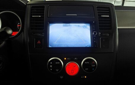Nissan Tiida, 2010 год, 850 000 рублей, 13 фотография