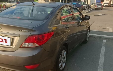 Hyundai Solaris II рестайлинг, 2011 год, 730 000 рублей, 3 фотография