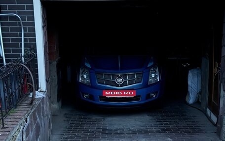 Cadillac SRX II рестайлинг, 2011 год, 1 000 000 рублей, 6 фотография