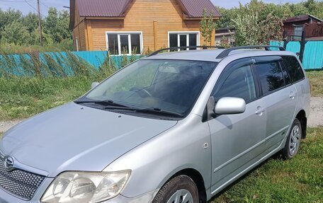 Toyota Corolla, 2004 год, 649 000 рублей, 3 фотография