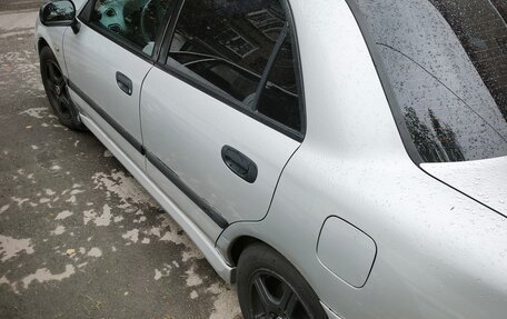 Mitsubishi Carisma I, 2002 год, 250 000 рублей, 10 фотография