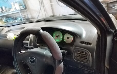 Mazda 323, 2003 год, 180 000 рублей, 8 фотография