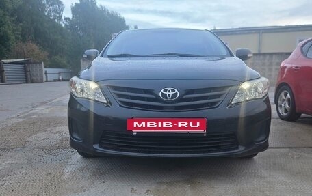 Toyota Corolla, 2011 год, 855 000 рублей, 28 фотография