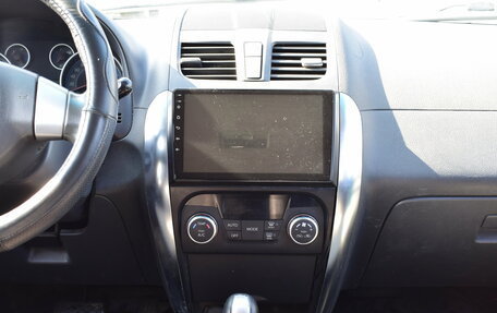 Suzuki SX4 II рестайлинг, 2010 год, 797 000 рублей, 17 фотография