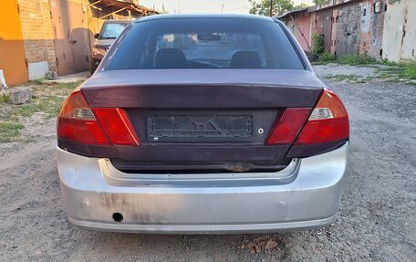 Mitsubishi Lancer VII, 1998 год, 85 000 рублей, 3 фотография