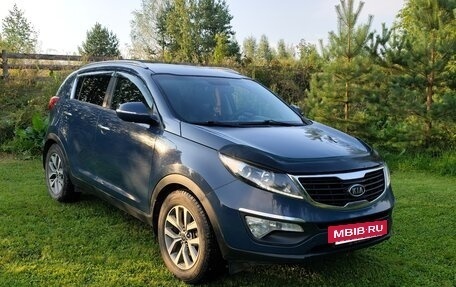 KIA Sportage III, 2011 год, 1 100 000 рублей, 14 фотография
