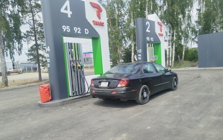 Oldsmobile Aurora II, 2000 год, 600 000 рублей, 8 фотография