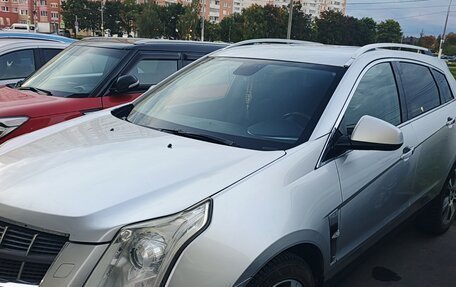 Cadillac SRX II рестайлинг, 2012 год, 1 020 000 рублей, 3 фотография