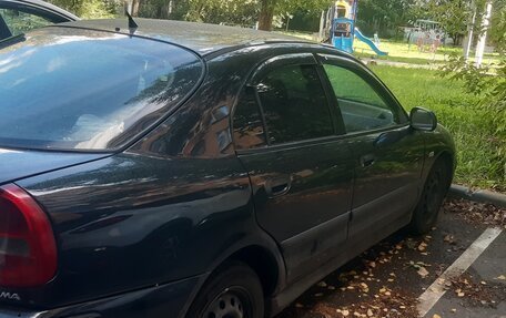 Mitsubishi Carisma I, 2003 год, 400 000 рублей, 4 фотография