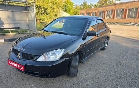 Mitsubishi Lancer IX, 2009 год, 230 000 рублей, 2 фотография