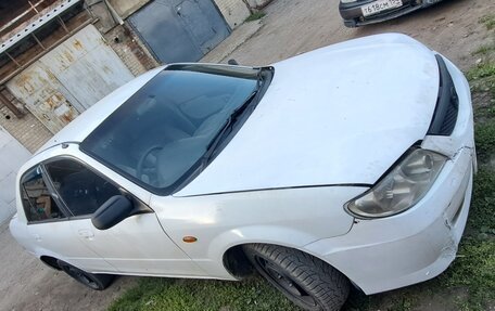 Mazda Familia, 2001 год, 170 000 рублей, 3 фотография