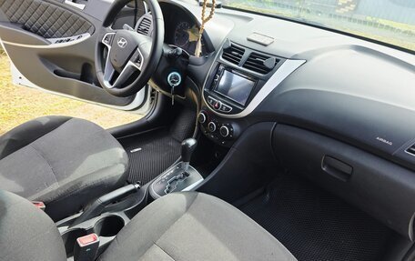 Hyundai Solaris II рестайлинг, 2014 год, 700 000 рублей, 17 фотография
